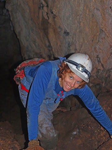 Jessica Metcalf in a cave during an archaeological dig in Tasmania.
